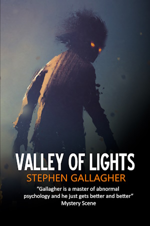 Valley of Lights paperback cover, a stalking creature with fiery eyes looking back over its shoulder at us